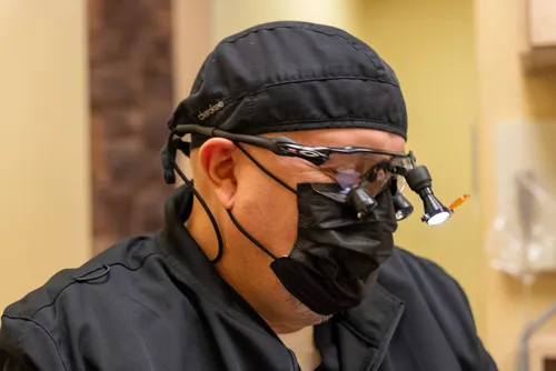 Dr. Anderson performing dental treatment